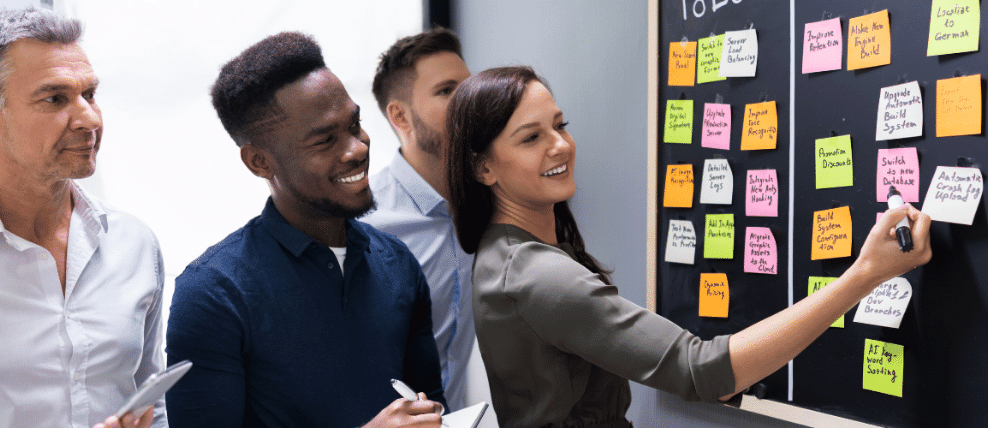 prosci-change-managers-and-project-managers-planning-on-kanban-board